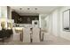 Open dining area adjacent to the kitchen, featuring modern pendant lighting at 15757 W Pioneer St, Goodyear, AZ 85338