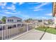 Second story outdoor balcony featuring an outdoor sitting area and artificial turf at 16029 N 171St Dr, Surprise, AZ 85388