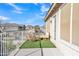 Balcony featuring an artificial turf carpet, a seating area, and a view of the neighborhood at 16029 N 171St Dr, Surprise, AZ 85388