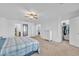 Spacious bedroom features a ceiling fan and a neutral color palette, promoting relaxation at 16029 N 171St Dr, Surprise, AZ 85388