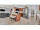 Kitchen with stainless appliances, granite counters and a breakfast bar at 16029 N 171St Dr, Surprise, AZ 85388