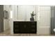 Modern bathroom with dark wood vanity, white countertops, and decorative vases at 16765 W Bronco Trl, Surprise, AZ 85387