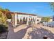 Expansive backyard featuring a covered patio and outdoor kitchen, ideal for outdoor enjoyment at 2091 E Flintlock Way, Chandler, AZ 85286