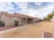 Backyard patio with stucco wall and easy to maintain desert landscaping at 2101 S Yellow Wood -- # 22, Mesa, AZ 85209