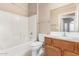 Cozy bathroom with a shower-tub combination, light wood vanity, and neutral wall color at 2101 S Yellow Wood -- # 22, Mesa, AZ 85209