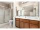 Well-lit bathroom vanity and shower at 2101 S Yellow Wood -- # 22, Mesa, AZ 85209