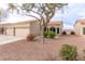 Charming single-story home with neutral stucco, tile roof, and desert landscaping at 2101 S Yellow Wood -- # 22, Mesa, AZ 85209