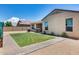 Landscaped backyard offering a well-manicured lawn and ample space for outdoor enjoyment at 26020 N 138Th Ln, Peoria, AZ 85383