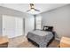 Cozy bedroom with neutral walls, carpet, ceiling fan, and closet at 26020 N 138Th Ln, Peoria, AZ 85383