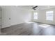 Bedroom with neutral walls, dual windows, ceiling fan and a closet door at 2749 E Wier Ave, Phoenix, AZ 85040