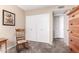 Cozy bedroom with neutral walls, plush carpet, and a classic rocking chair at 3408 W Taro Ln, Phoenix, AZ 85027