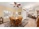 Cozy dining area featuring a ceiling fan, and a breakfast nook at 3408 W Taro Ln, Phoenix, AZ 85027