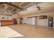 Bright and spacious garage with epoxy floor, water heater and ample storage at 3408 W Taro Ln, Phoenix, AZ 85027