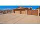 Three-car garage with brick accents, paired with a concrete driveway and gated entryway at 3408 W Taro Ln, Phoenix, AZ 85027