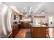 Kitchen with stainless steel appliances, granite countertops, and an island with seating at 3408 W Taro Ln, Phoenix, AZ 85027