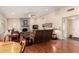 Bright living room with fireplace, hardwood floors, and a cozy seating area at 3408 W Taro Ln, Phoenix, AZ 85027