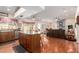 Open living space combining kitchen island, dining nook, and hardwood floors for easy living at 3408 W Taro Ln, Phoenix, AZ 85027