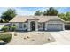 Charming single-story home with desert landscaping, tile roof, and an attached two-car garage at 3613 E Baranca Ct, Gilbert, AZ 85297