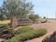 Community entrance sign at Copper Basin, landscaped with trees and desert plants at 3896 E Aragonite Ln, San Tan Valley, AZ 85143