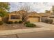 A cozy home with desert landscaping and mature trees at 3896 E Aragonite Ln, San Tan Valley, AZ 85143