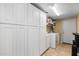 Laundry room with white cabinets and a washer and dryer at 3896 E Aragonite Ln, San Tan Valley, AZ 85143