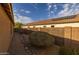 Side yard with desert landscaping, providing low-maintenance appeal and privacy at 3896 E Aragonite Ln, San Tan Valley, AZ 85143