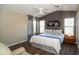 Inviting main bedroom featuring vaulted ceilings, a ceiling fan, and plenty of natural light at 4032 E Jojoba Rd, Phoenix, AZ 85044