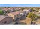 Aerial view showcasing the home, large backyard, and the surrounding neighborhood at 43524 W Bailey Dr, Maricopa, AZ 85138