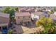 This home has an aerial view of the backyard, patio, and surrounding neighborhood at 43524 W Bailey Dr, Maricopa, AZ 85138