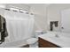 Bathroom featuring a tub, shower, commode, vanity, sink, and mirror at 43524 W Bailey Dr, Maricopa, AZ 85138