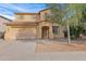 Charming two-story home with a two-car garage and low maintenance desert landscaping at 43524 W Bailey Dr, Maricopa, AZ 85138