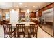 A spacious kitchen featuring stainless steel appliances, a large island, and beautiful cabinetry at 4488 N 155Th Ave, Goodyear, AZ 85395