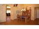 Dining room with tile flooring, and a view into the open concept living spaces at 455 W Gary Ave, Gilbert, AZ 85233