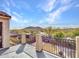 View from the balcony featuring mountain views and landscaped backyard at 5137 W Quail Track Dr, Phoenix, AZ 85083