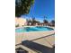 Outdoor community pool with lounge chairs on a sunny day at 5228 N 15Th Dr, Phoenix, AZ 85015