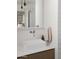 Bathroom featuring a square sink, modern faucet, and a minimalist design with clean lines and neutral tones at 6114 N 8Th St, Phoenix, AZ 85014