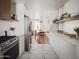 A view from the modern kitchen, overlooking the adjacent dining space at 6114 N 8Th St, Phoenix, AZ 85014