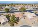 Birds eye view of a suburban single Gathering home with desert landscaping, tile roof, and a private driveway at 6450 S Windstream Pl, Chandler, AZ 85249