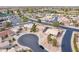 Residential aerial showcases a planned community with sidewalks, desert landscaping and tile roofs at 6450 S Windstream Pl, Chandler, AZ 85249