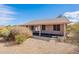 View of a backyard patio featuring gravel landscaping and desert plants at 6450 S Windstream Pl, Chandler, AZ 85249