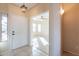 Inviting foyer with tile flooring and views of the living area at 6450 S Windstream Pl, Chandler, AZ 85249