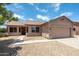 Charming single-story home showcasing desert landscaping and a well-maintained facade at 6450 S Windstream Pl, Chandler, AZ 85249