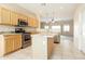 Spacious kitchen boasting granite countertops and stainless steel appliances at 6450 S Windstream Pl, Chandler, AZ 85249