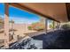 A covered outdoor patio features desert landscaping and views of the community at 6450 S Windstream Pl, Chandler, AZ 85249