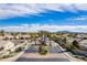 Street view of entry to active adult community, Springfield, with palm trees and mountain views at 6450 S Windstream Pl, Chandler, AZ 85249