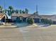 Single-story home with landscaped front yard, two-car garage, and desert landscaping at 7551 W Pasadena Ave, Glendale, AZ 85303