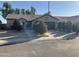 Single-story home with landscaped front yard, two-car garage, and desert landscaping at 7551 W Pasadena Ave, Glendale, AZ 85303