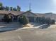 Single-story home with landscaped front yard, two-car garage, and desert landscaping at 7551 W Pasadena Ave, Glendale, AZ 85303