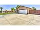 Spacious home garage and large driveway at 8037 W Sweetwater Ave, Peoria, AZ 85381