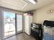 Garage with storage units, workspace, and an entry to the outside at 944 S Nickel Dr, Apache Junction, AZ 85119